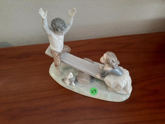 Lladro - Boy and girl on seesaw with dog