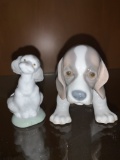 Two Lladro porcelain Dogs sitting down