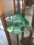 Green Fish swimming with mirrored base