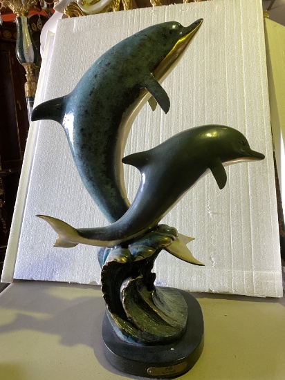 26"H Two Dolphins jumping out of a wave titled "PALS" By W. Aribu