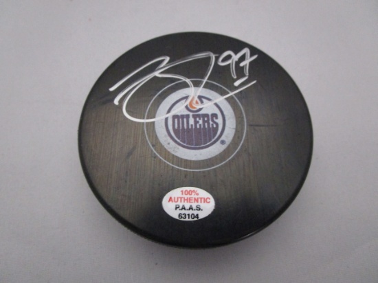 Connor McDavid of the Edmonton Oilers signed autographed logo hockey puck PAAS COA 104