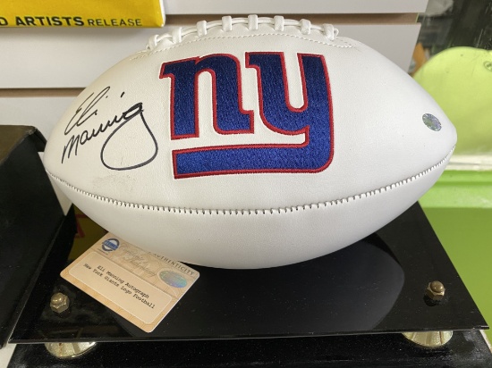 Eli Manning Autographed  New York Giants Logo Ball Autnenticated by Steiner  Sports
