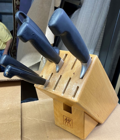 Henkel Butcher Block Knife Block with (4) Knives and a Sharpener. The rest of the Knives are Missing