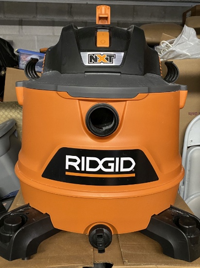 Rigid Wet and Dry Vacuum with 6 H.P. Motorcomes with box and attachments (used on once)