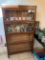 A 4 Shelf Bookcase with Sliding Glass Doors