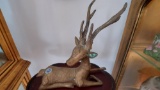 Lying Bronze With Antlers