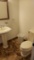 Complete Bathroom, Includes Kohler Pedestal Vanity, Kohler Water Closet, Mirror And Three Bulb Vanit