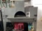 Bakers Pride Model 616 Professional Pizza Oven, (3) Brick. Unit Is Mounted On Casters And Brand New