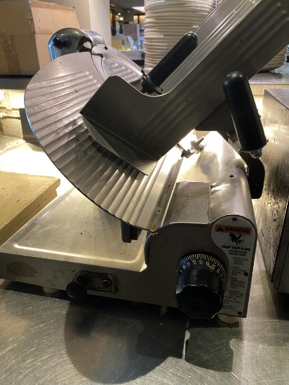 Globe model 3600 Meat Slicer with 12" Blade and attached Blade Sharpener