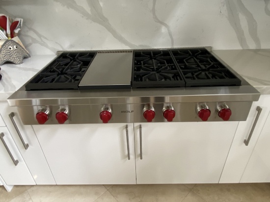 48" Wolf Range With (6) Burners And 12" Griddle