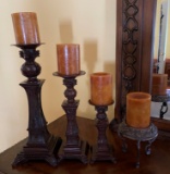 Set Of Four Candlestick Holders With Candles