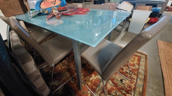 71 x 33 1/2 Glass Top Table With (6) BoConcept Chairs