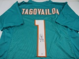Tua Tagovailoa of the Miami Dolphins signed autographed football jersey PAAS COA 043