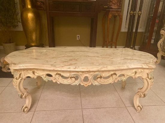 53" Faux Marble And Heavily Carved Wood Coffee Table
