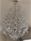 Large Ornate Crystal Hanging Chandelier with over (30)  illuminated Candle Style Lights. The Chandel