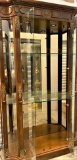 Incredible Two Glass Door Curio Cabinet with side glass viewing panels adorned with Brass Filigree D