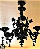 Classic Black Hand Blown  glass chandelier by Murano. The Chandelier is embellished by flowers, leav