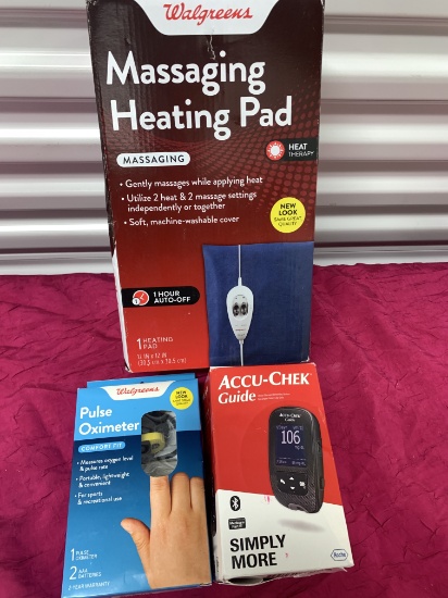 3- New Assorted Items 1- Heating Pad, 1- Pule Oximeter, 1- Accu Chek Blood Monitor