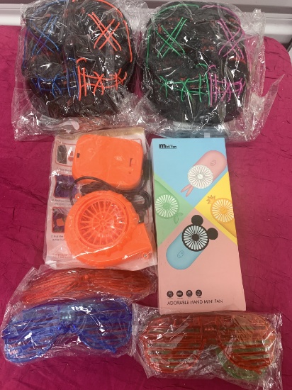 8- New Kids Items 2- Color Masks, 1- Mini Fan, 4- Color Glasses, 1- Fan