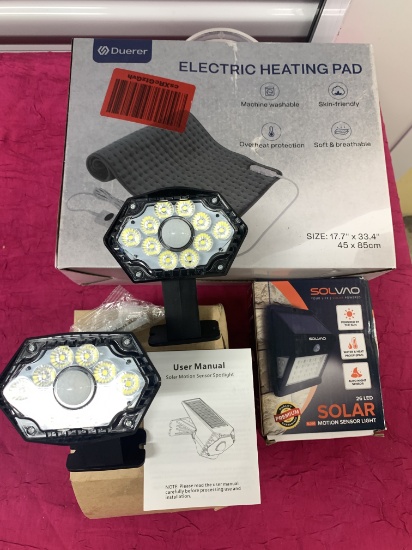 3- New Heating Pad, 2- Solar Spotlights, 1- Solar Motion Light