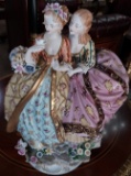 2 Young Ladies smelling flowers in Porcelain - 15 in.