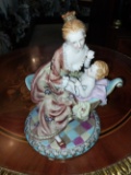 Porcelain mother holding baby - 8 inches