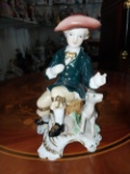 Boy sitting with dog in porcelain - 7.5 inches
