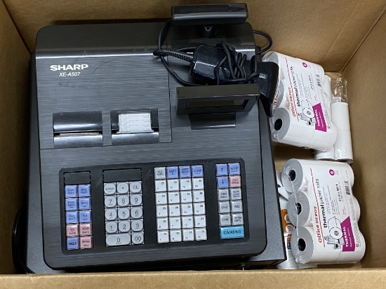 Sharp XE A507 cash register system with thermal paper rolls and hand scanner looks relatively new