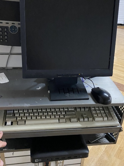 HP Computer Station with small HP Computer Keyboard Mouse, and Screen comes on a small computer wall