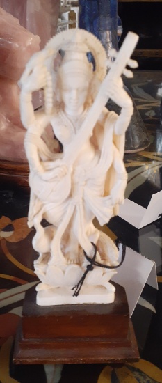 Hand Carved Bone - Tiben Musician - 7.5 in with wooden base
