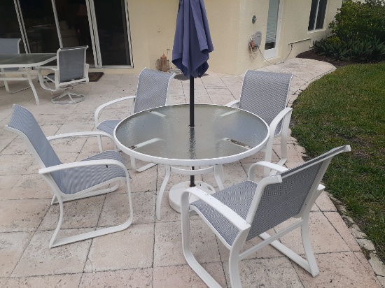 Outdoor patio table and 4 chairs and Umbrella -small chips