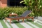 BRAND NEW OUTDOOR 100% FSC SOLID WOOD AND BLACK SLING CHAISE LOUNGER - ORIGINAL PACKAGING