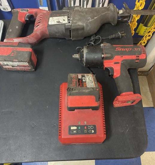 Snap On Battery Operated Set With Reciprocating Saw, And Half Inch Impact, Gun, Battery And Charger