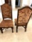 A Pair of Dining Room Chairs with A Provincial Fabric Covering