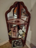 Mirrored Corner Shelving Unit with Contents