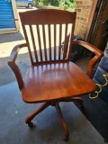 Rolling Wood Arm Chair
