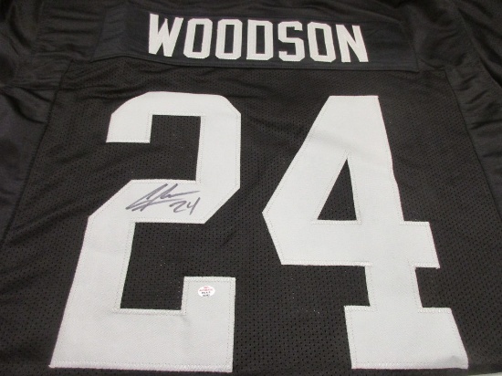 Charles Woodson of the Oakland Raiders signed autographed football jersey PAAS COA 342