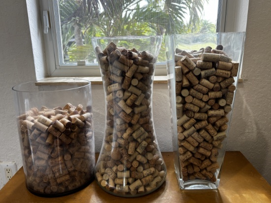 Assorted Wine Cork Collection in Glass Vases