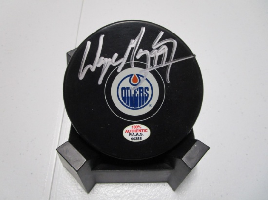 Wayne Gretzky of the Edmonton Oilers signed autographed logo hockey puck PAAS COA 385