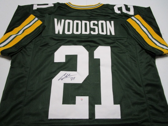 Charles Woodson of the Green Bay Packers signed autographed football jersey PAAS COA 284