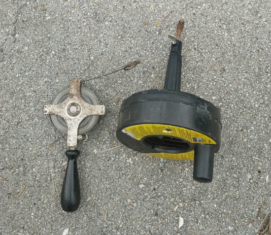 Plumbing snake by Cobra and vintage tape measure