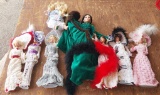 8 Dolls - Various sizes with some with stands