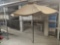 (3) Red, (1) Tan and (1) Off White Outdoor Umbrellas