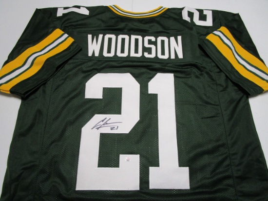 Charles Woodson of the Green Bay Packers signed autographed football jersey PAAS COA 276