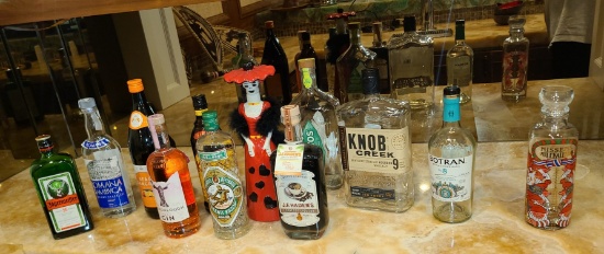 Liquor bottle lot, three are full