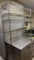 Metro rack with 87 inch poles and four shelves