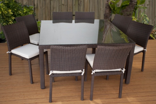 BRAND NEW ORIGINAL PACKAGING OUTDOOR GLASS TOP 60" TABLE WITH 8 STACKING CHAIRS - BROWN