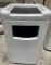 Trash receptacle with top tray holder