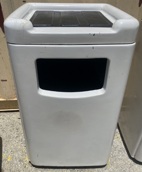 Trash receptacle with top tray holder