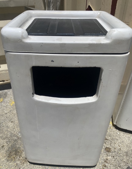 Trash receptacle with top tray holder